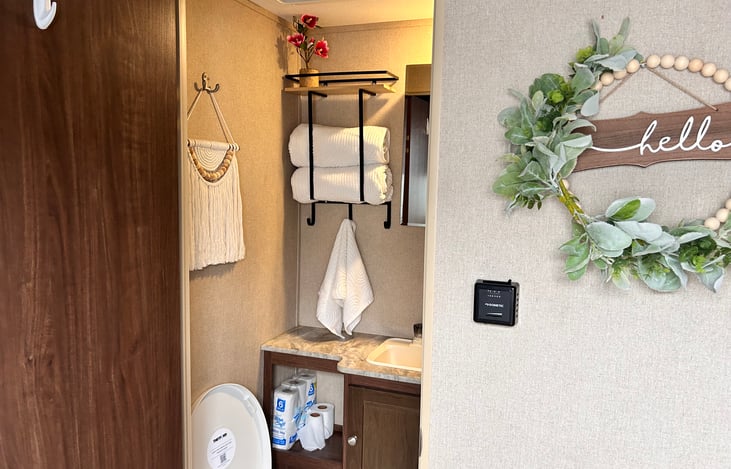 Full bathroom with new and improved toilet and shower head!