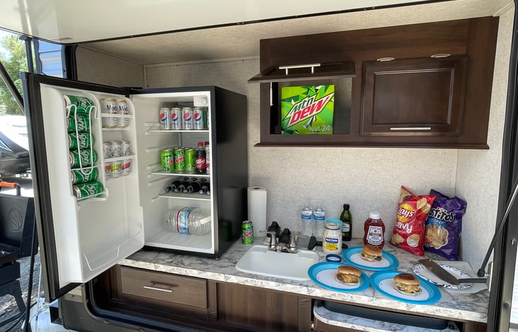 You’re going to love how easy the outdoor kitchen makes camping.