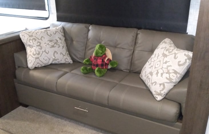 Jack knife couch with storage