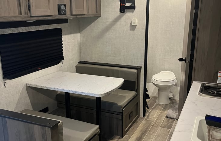 Dining area that turns into a bed either one adult or two children