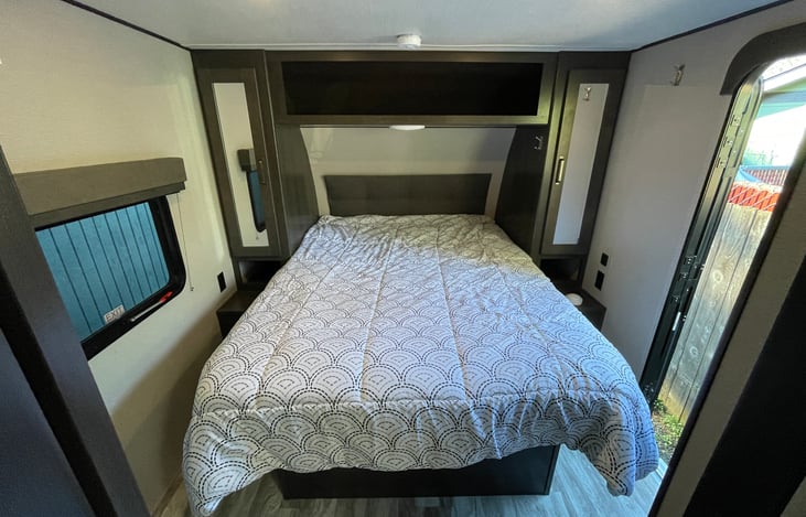 Queen bed with memory foam topper