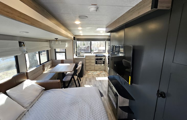 Living area with couch made to double bed