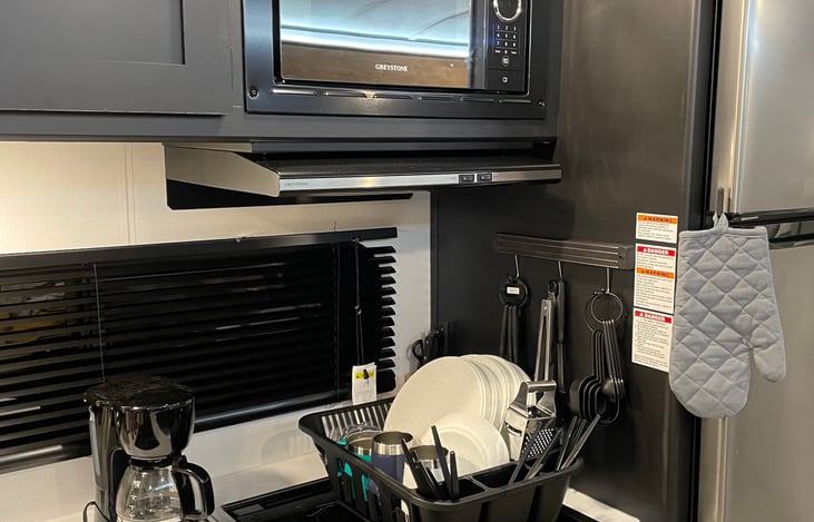 A fully stocked kitchen with everything you need to prepare and serve meals.