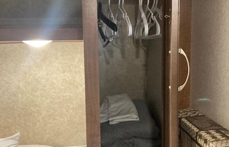 Master BR Closet Space located on both sides of the bed.