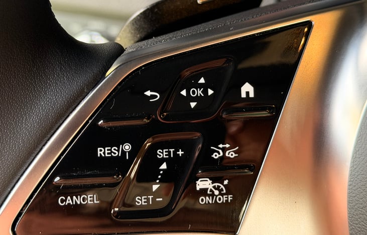 Steering wheel controls for cruise control and home button
