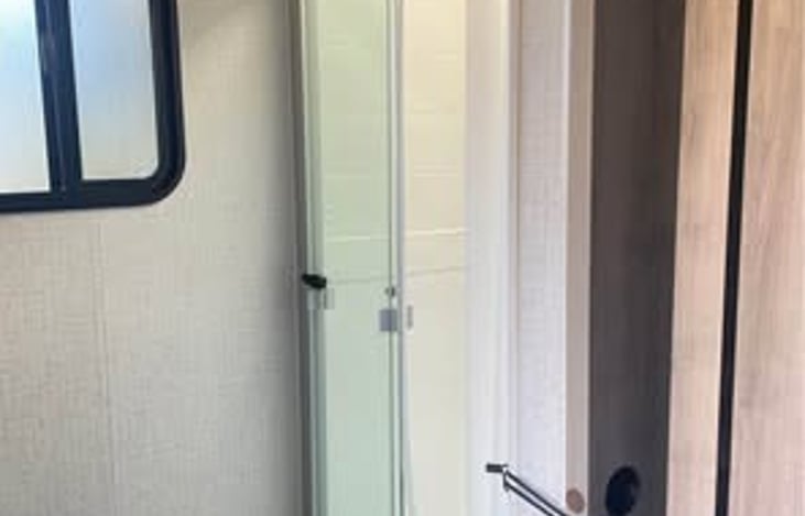 Warm showers with glass enclosure.