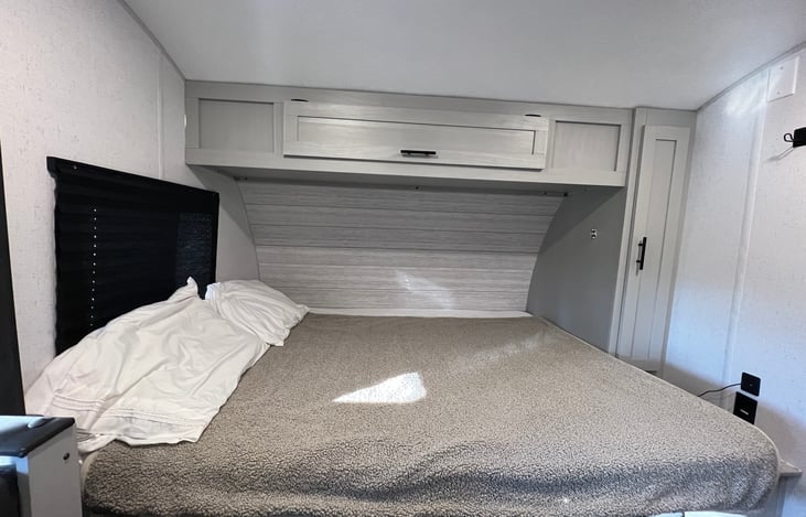 Murphy bed. Couch during the day. Queen bed at night