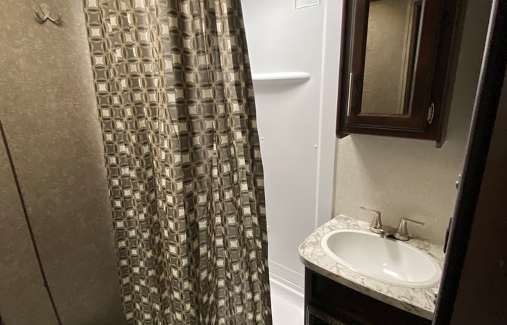 Full bath, with shower, sink & toilet