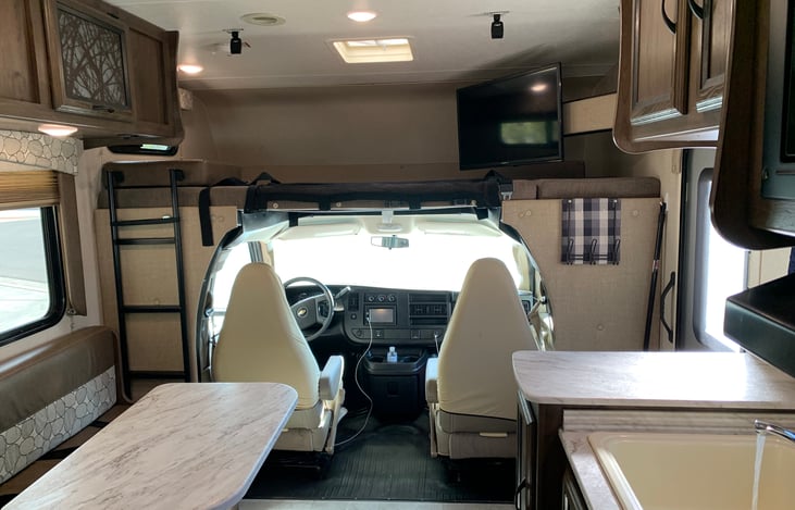 Adjustable indoor TV with Blue Ray DVD player, DVD's included.