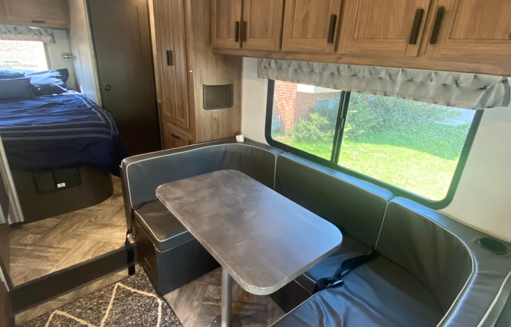 Dining table folds down into a bed.