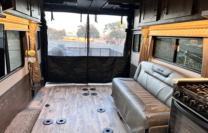 Clear plastic curtain to patio to keep the bugs out & still enjoy the view