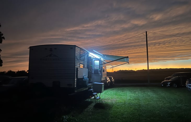 "At night" the awning lights cover a good bit.