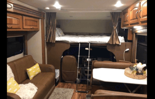 HOME ON WHEELS - HAPPY CAMPER