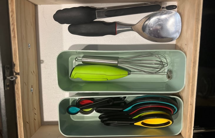Additional cooking utensils are available as well; spoons, scissors, can opener, whisks, hot chocolate mixer, tongs and measuring cups.