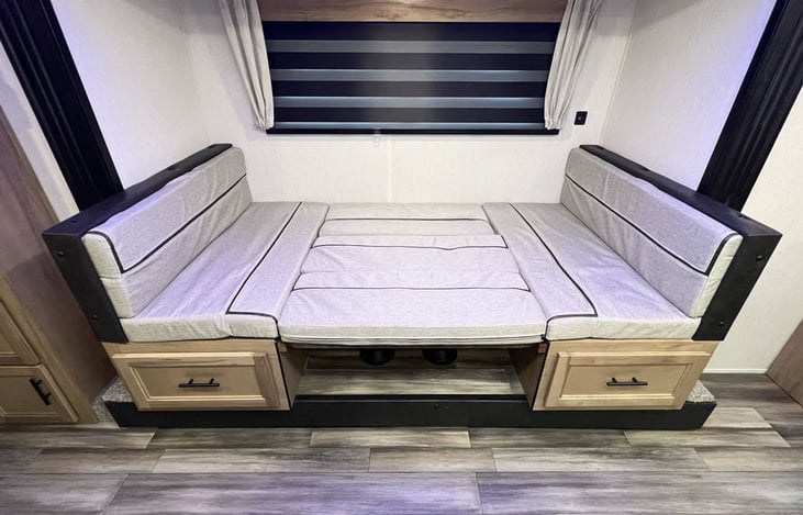 Dinette set collapsed into a bed