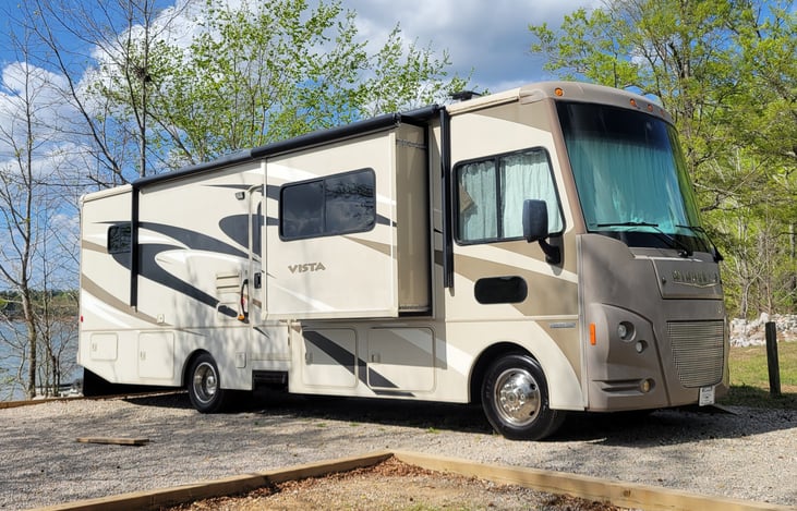 30 feet means it'll fit in most campsites with room to spare. Easier to park than our little travel trailer. Cameras and mirrors are excellent