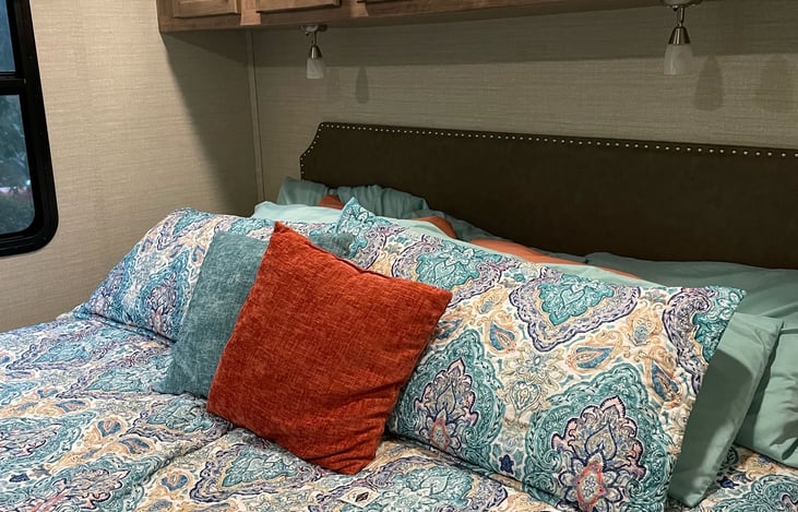 King size bed in the master bedroom.  This room has plenty of storage as well.