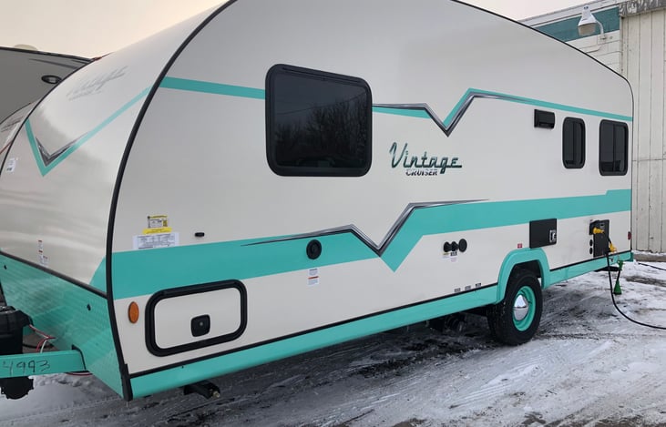 Exterior street side - the 2021 Vintage Cruiser is sleek and stylish; it even has chrome baby moon hubcaps