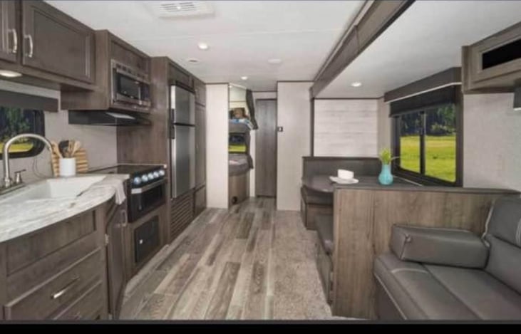 Dinette & sofa can be made into a bed.  Located in the slide out.