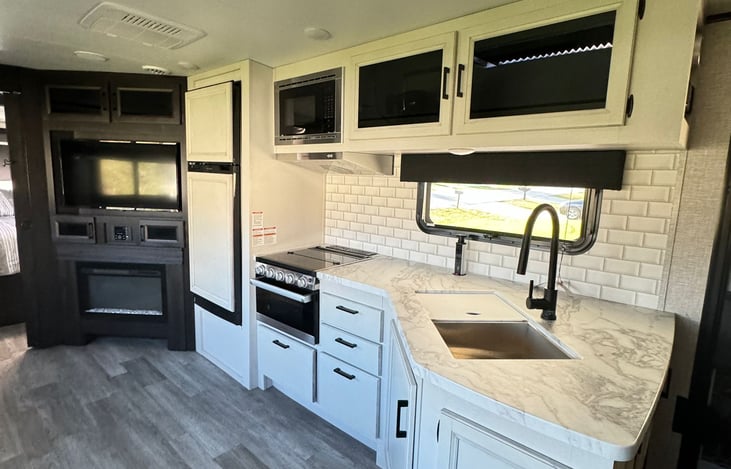 kitchen, fridge and living room entertainment