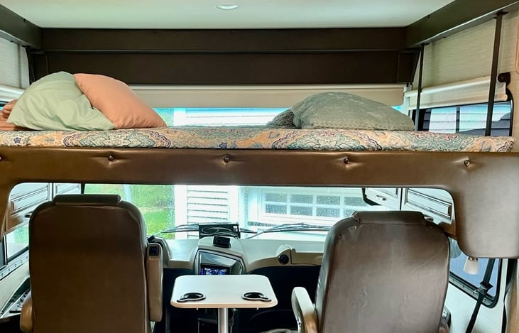 Queen size bunk for additional bedding.