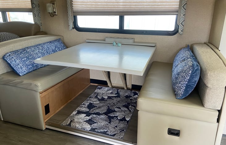 Dinette area with cupholders~also converts to bed