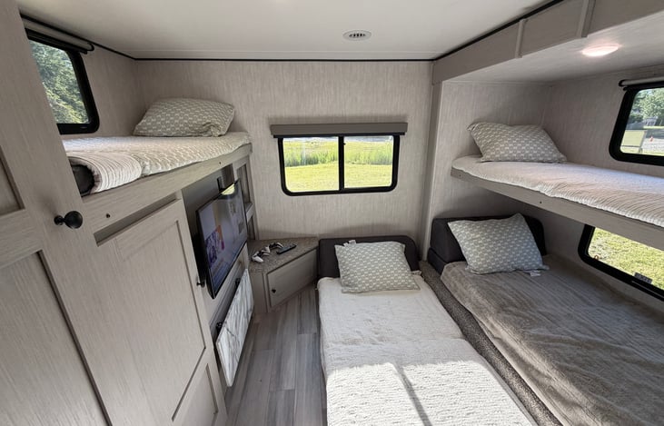 4 beds in bunkhouse. Each lower bed does have its own mattress.