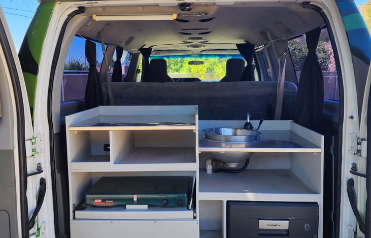 Has a well thought out Kitchen. With a Propane stove, Refrigerator and Fresh water sink.