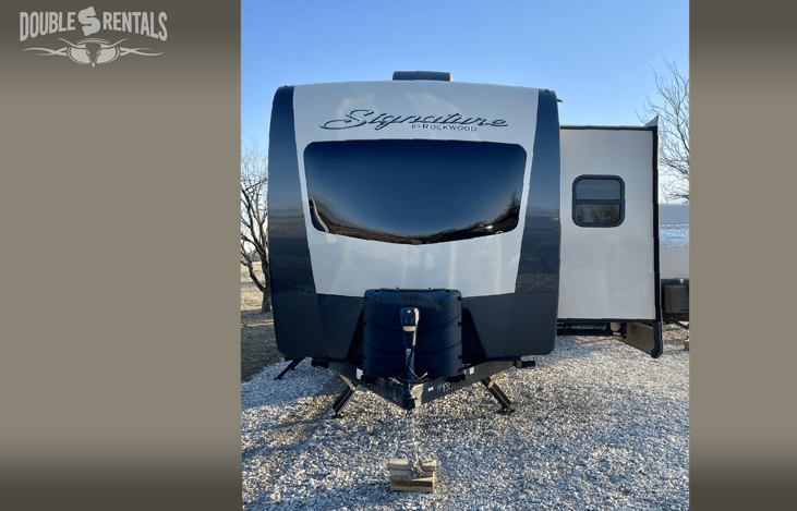 Front with Large Bedroom Window, Power Jacks, Power Stabilizers and You'll LOVE the Auto Leveling System, Makes Set-Up  a Breeze!