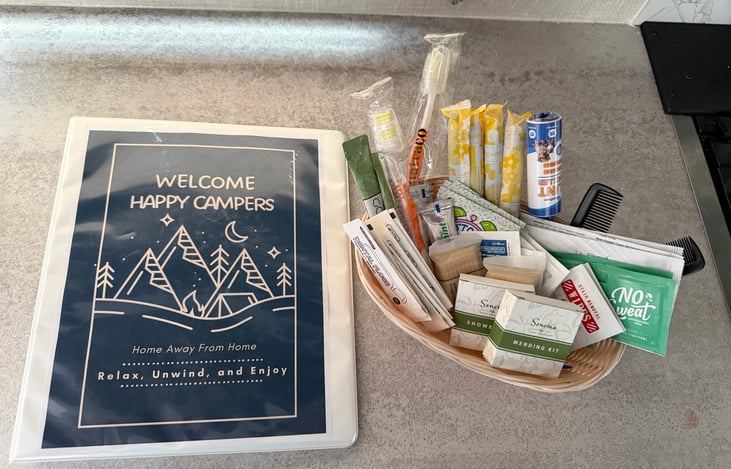 Guest binder and basket of necessities