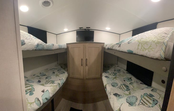4 bunks with separate door.