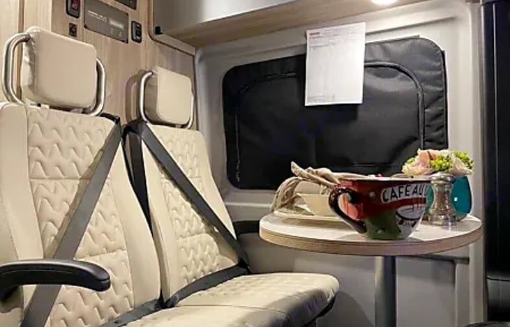 This inviting space captures the essence of comfort and relaxation, where the kitchen becomes a central hub for culinary creations.