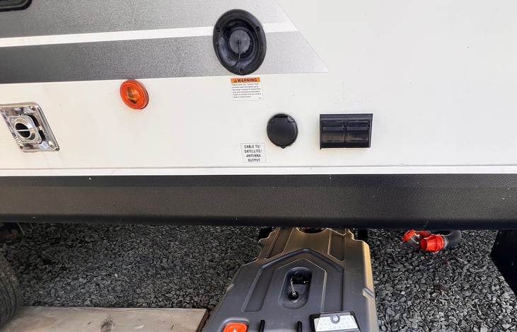 Complimentary honeywagon and 50gallon fresh water tank fill up when you are boondocking (no water/sewer hookups on the site).