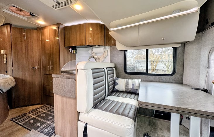 The interior is bright, modern and comfortable, and the L-shaped kitchen feels extra spacious.