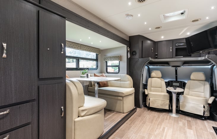 Front seats swivel with a removal cocktail table for more seating options.