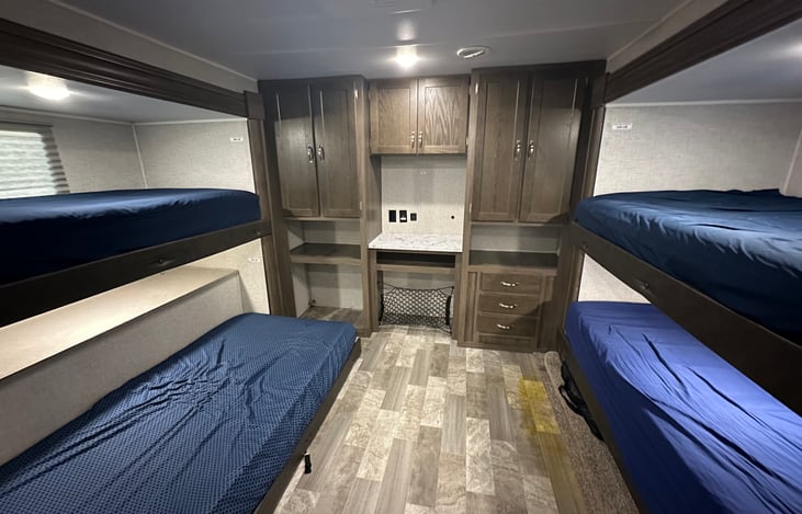 Separate Rear Bedroom with QUAD BUNKS -- all are 8"+ thick brand new memory foam mattresses -- no cheap RV mattresses here!