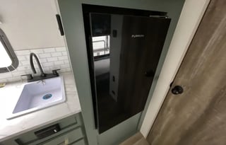 “The Cozy Nook Pet friendly RV Rental”.