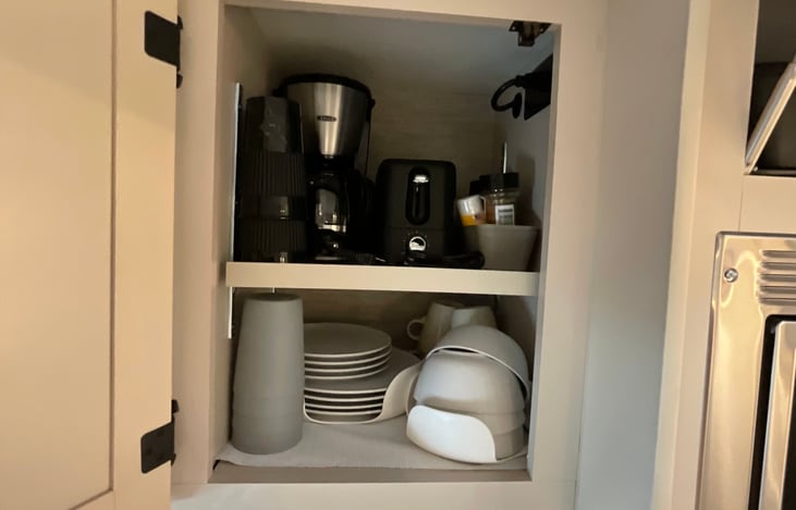 Kitchen supplies and coffee maker included. Additional add-ons include a Keurig coffee maker, a toaster, and more..