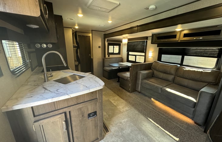 Full slide out offers a spacious living and sleeping area.