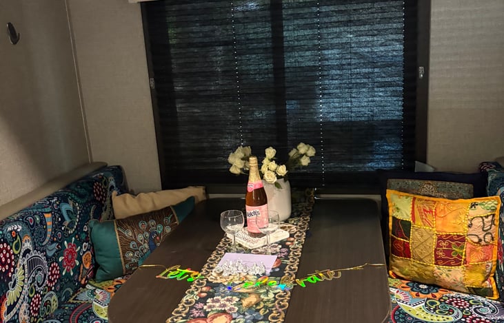 Table for 4 that is also a bed. Great for playing games and cards on those rainy days.