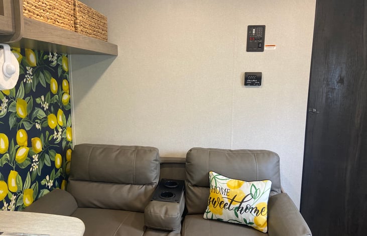 Sofa bed. Baskets are for storage.