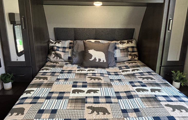 Cozy front bedroom with queen size bed, plenty of storage and your own entrance.