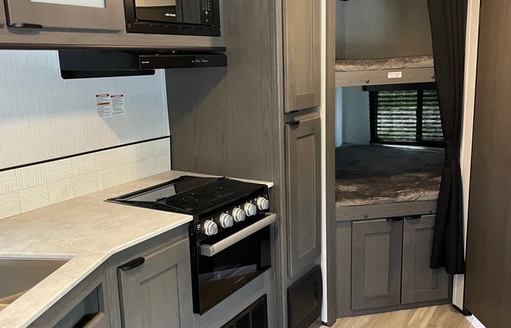 Kitchen and double bunkbeds