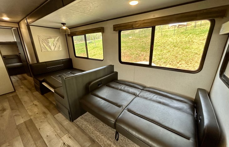 Dinette and Sofa fold down to additional sleeping areas
