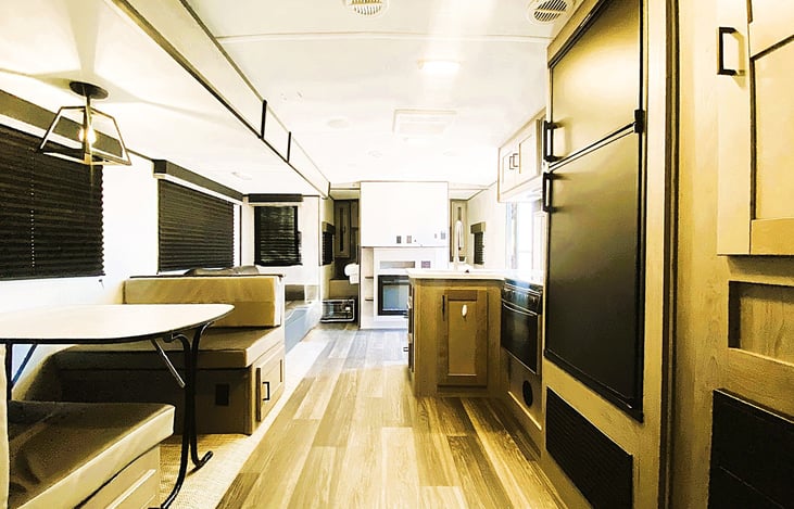 Open living space with a full kitchen and storage galore — your mobile basecamp for trips to Zion National Park or Sequoia National Forest.