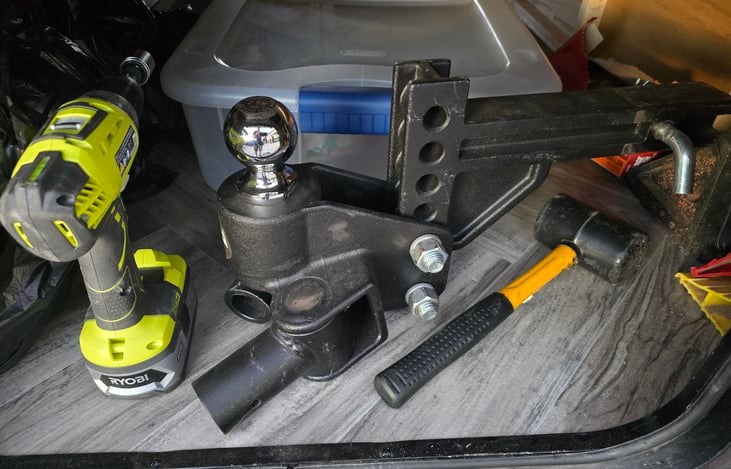 Weight distribution hitch and driver for leveling feet included in rental.