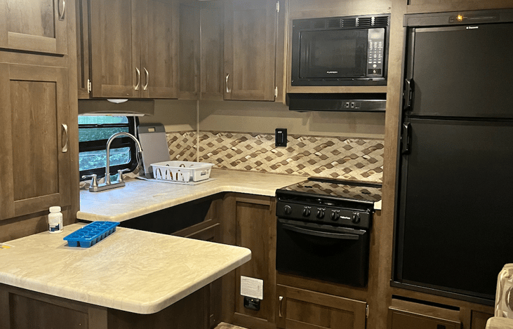 Full kitchen. LOTS of cabinet space!