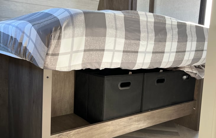 Footboard storage in Front Master Bedroom.