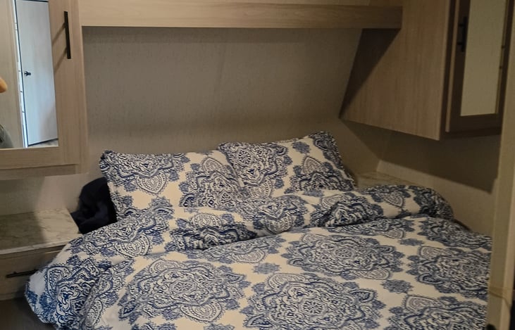 Queen sized bed in the master area.  Nice comfy new mattress with fresh linens.