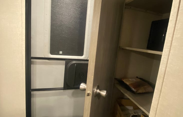 large linen closet in master bedroom ... use the extra space to shove all the decorative pillows from the comfy bed!